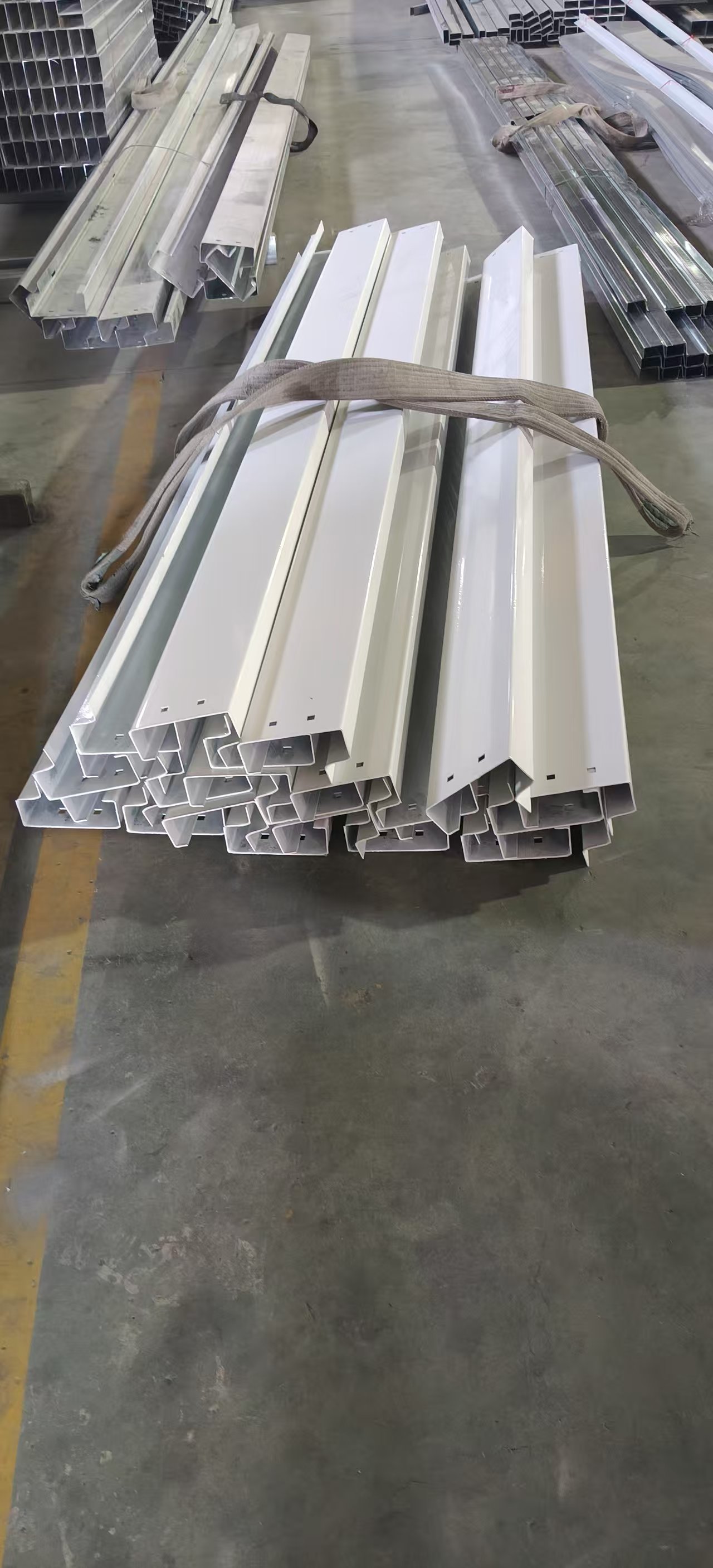 Modular panel components stacked in factory