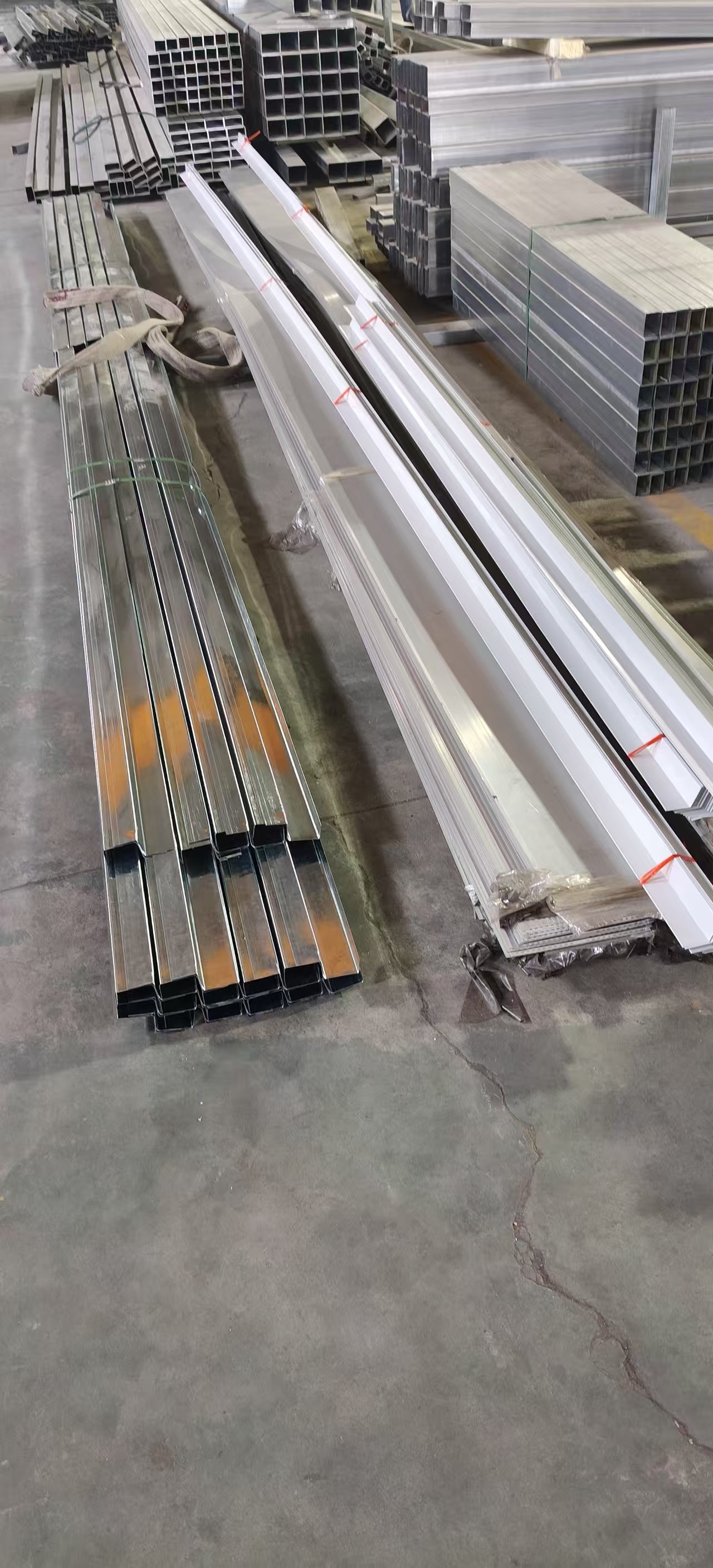 Aluminium profiles stacked in factory